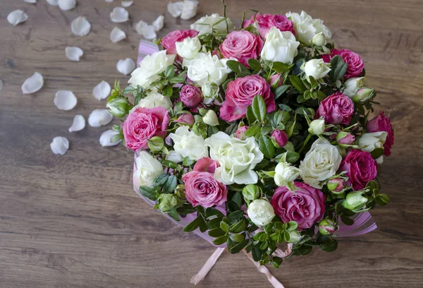 stock image beautiful bouquet of flowers of roses on a light background, close-up