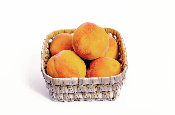 Peaches with red sides on a light background — Stock Photo, Image