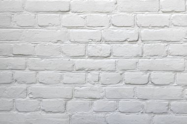 Beyaz duvarlı bir arkaplan, boyalı tuğla işi yakın plan