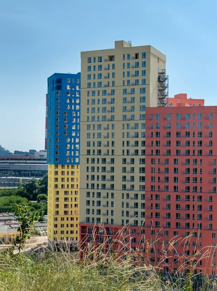 View of new residential high-rise buildings in bright colors. Newest residential complexes. Ukraine, Kiev.