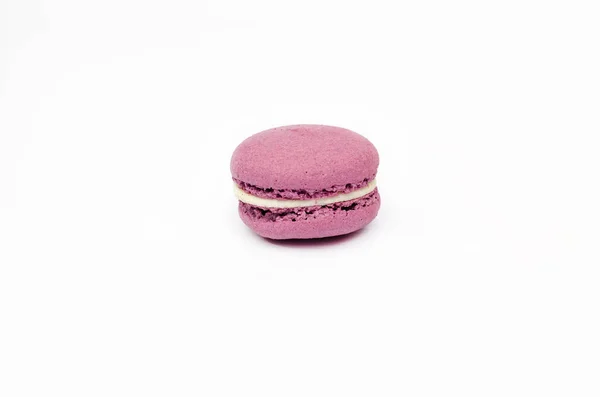 french dessert, french macarons (macaroons, macaroni) with strawberry filling, isolated, white background