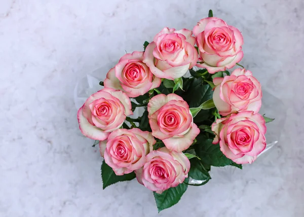 Beautiful pink roses, beautiful bouquet of flowers close up isolated on background