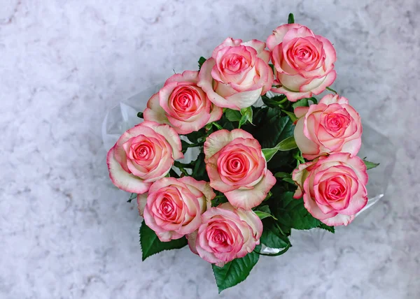 Beautiful pink roses, beautiful bouquet of flowers close up isolated on background