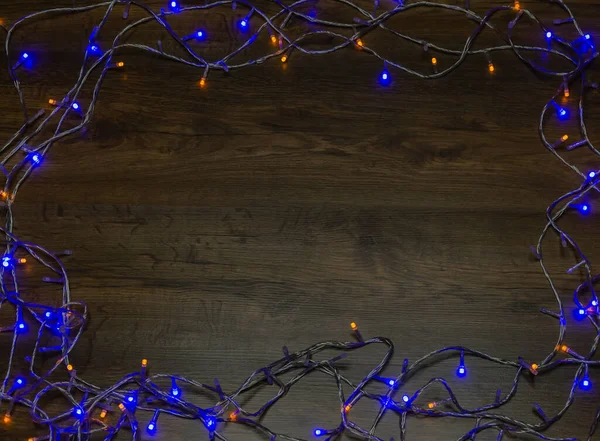 Fények Karácsonyi Koszorú Egy Asztal Gyönyörű Háttér — Stock Fotó