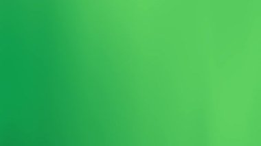 Yeşilin çeşitli tonlarında pürüzsüz, bulanık bir arkaplan
