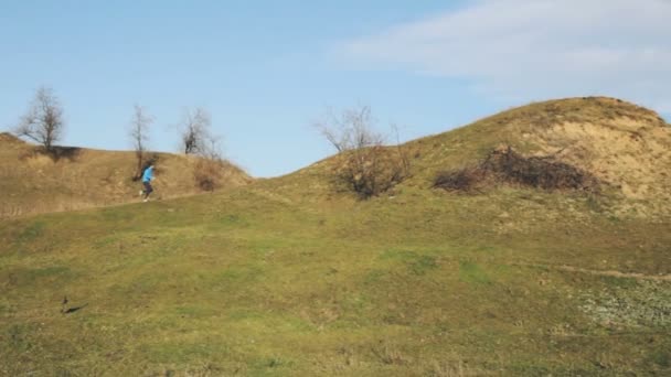 Young Male Trail Runner Training Outdoors — Stock Video