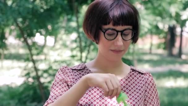 Young Woman Glasses Blowing Bubbles Outdoors Park — Stock Video