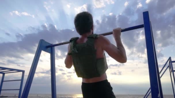 Young Bearded Athlete Training Outdoor Weighted Vest Exercise Military Plate — Stock Video