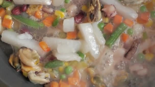 Sea food and vegetables frying on pan, close up — Stock Footage Sea Food Vegetables Frying Pan Close Royalty Free Stock Footage