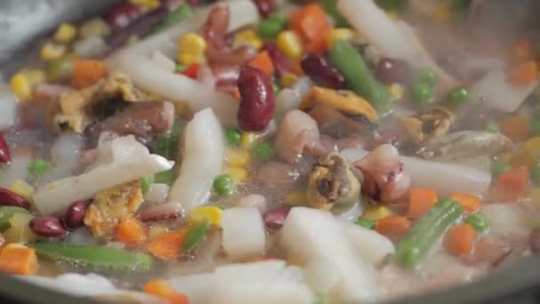 Sea food and vegetables frying on pan, close up — Stock Footage Sea Food Vegetables Frying Pan Close Video Clip