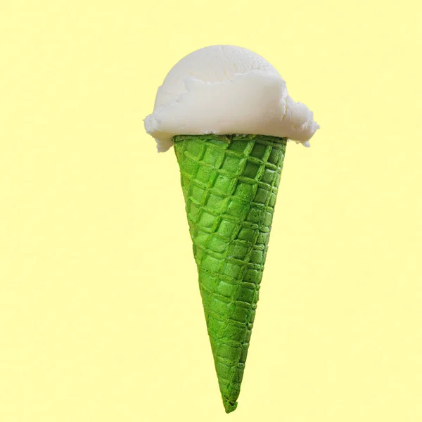 Vanilla ice cream green waffle cone — Stock Photo, Image