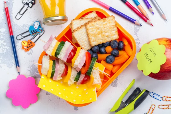 Lunch box and school supplies — Stock Photo, Image