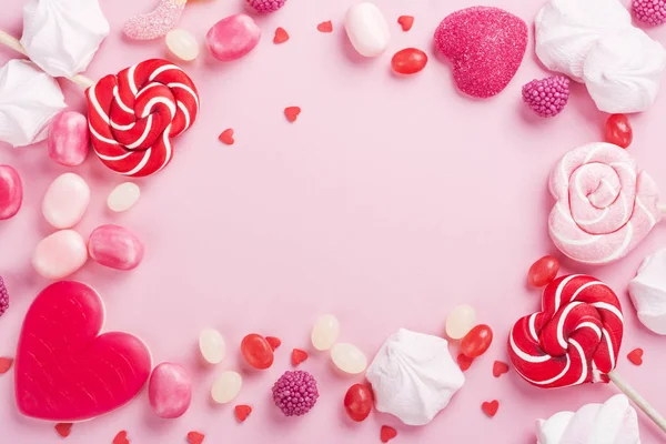 Candies, lollipops, jelly on pink — Stock Photo, Image