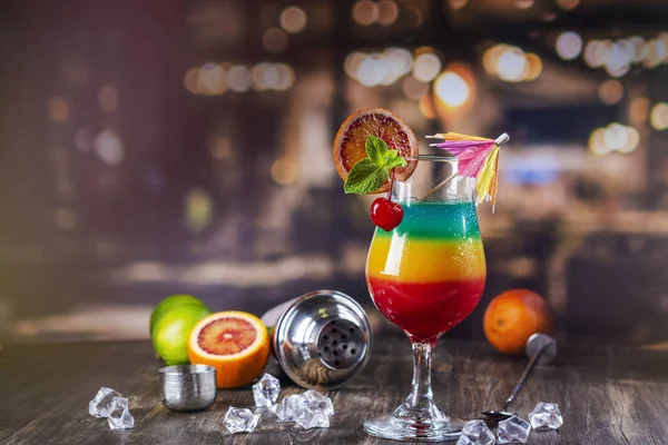 Summer rainbow layered cocktail