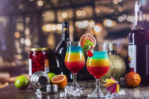 Summer rainbow layered cocktail