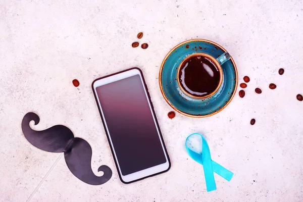 Coffee mug with sticked moustaches — Stock Photo, Image