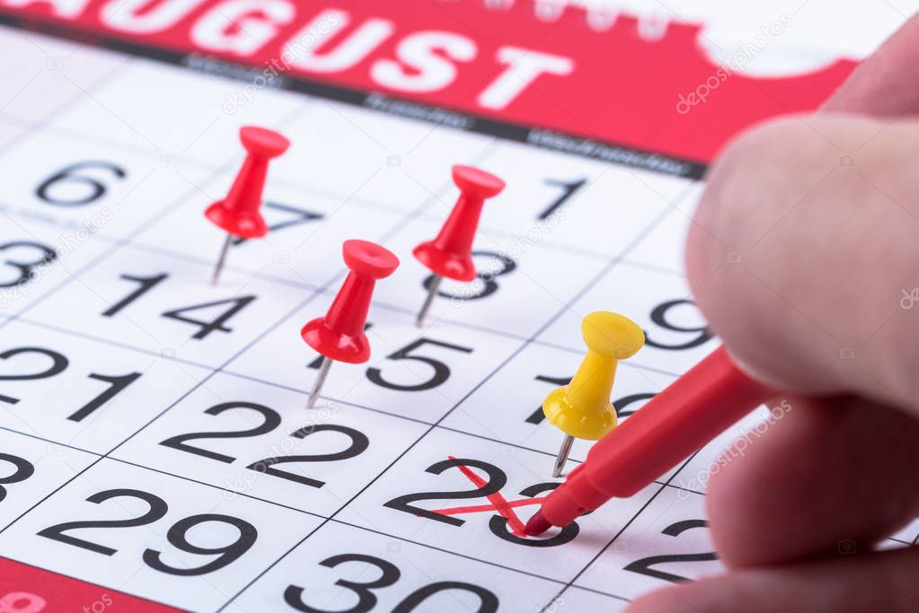 Marking an Important Date on a Calendar. Selective Focus.