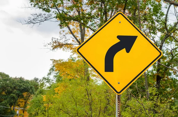 Yellow Traffic Sign Warning Agaist Dangerous Curve Ahead Cloudy Autumn — Stock Photo, Image