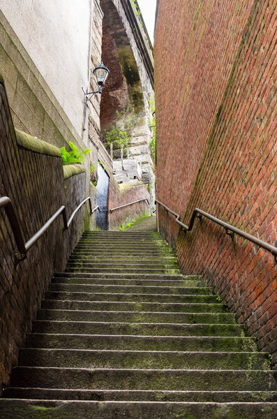 Narrow Stairway Between in Newcastle City Centre on a Cloudy Spring Morning. Newcastle upon Tyne, England, UK.