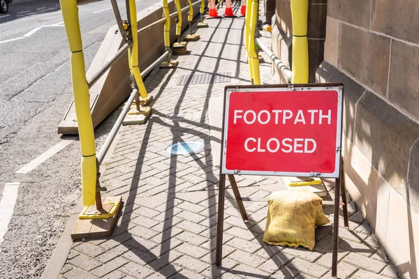 Red Sign Pavement Beginning Construction Site Telling Pedestrians Footpath Closed — Stock Photo, Image