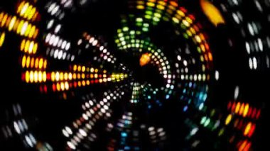 Soyut bir animasyonda dönen renkli disko topları izleyiciler için büyüleyici ve dinamik bir zemin oluşturuyor..