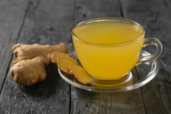 Ingwerwurzel Zitrone Orange Honig Und Zimt Auf Einem Schwarzen Tisch — Stockfoto