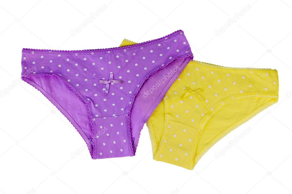 Yellow and purple cotton women's briefs isolated on white background. Fashionable concept. Beautiful lingerie.