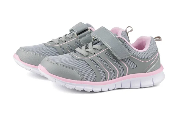 灰色与粉红色儿童运动鞋隔离在白色背景. — 图库照片