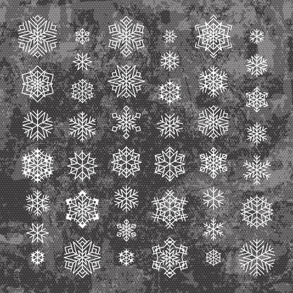 Witte sneeuwvlokken silhouetten geïsoleerd op abstract vector achtergrond in grijze kleuren — Stockvector