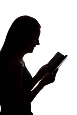bir kitap bir kızla silüeti