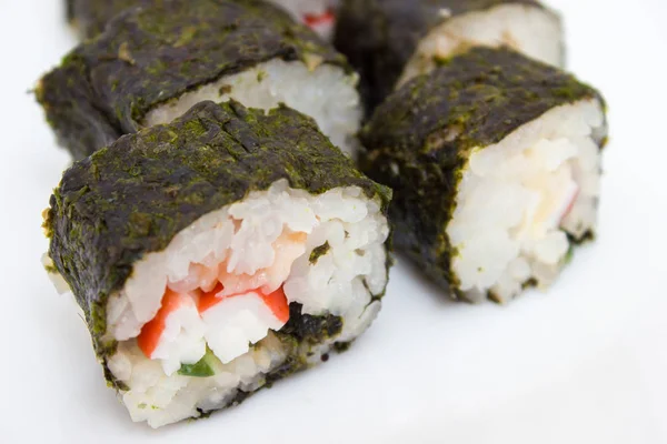 Cocina japonesa, sushi de arroz y pescado - primer plano — Foto de Stock