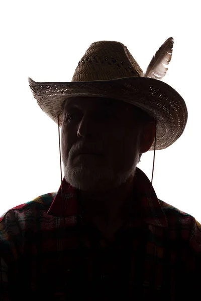 Homem velho em chapéu de cowboy, visão dianteira - silhueta de close-up escura — Fotografia de Stock