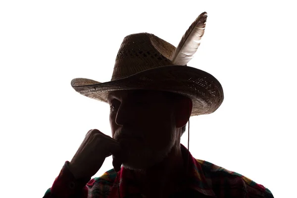 Velho pensativo em chapéu de cowboy, barba, visão frontal - silhueta — Fotografia de Stock
