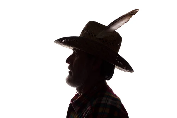 Homem velho em chapéu de cowboy, visão lateral - silhueta de close-up escura — Fotografia de Stock