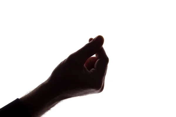 La mano dell'uomo scatta - silhouette — Foto Stock