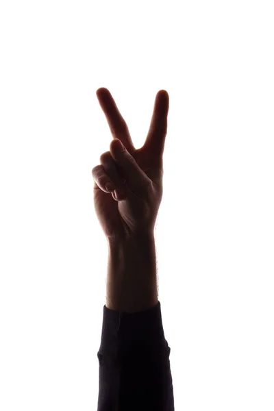 De hand jonge man met vingers uit elkaar, nummer twee-silhouet — Stockfoto