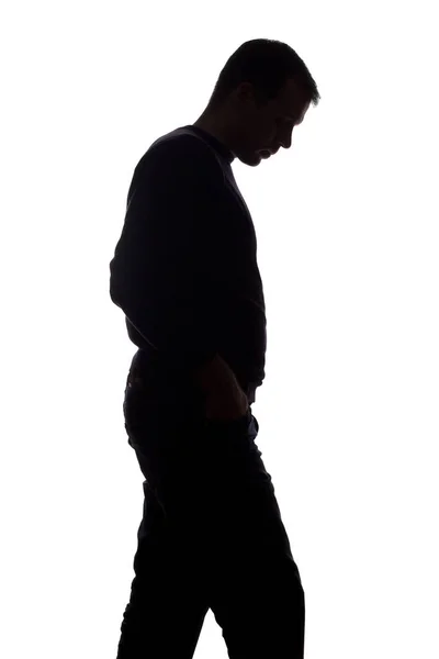 Retrato de un joven, vista lateral - silueta aislada oscura —  Fotos de Stock