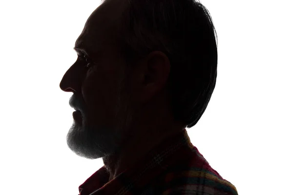 Retrato de um homem velho, vista lateral silhueta de close-up escuro — Fotografia de Stock