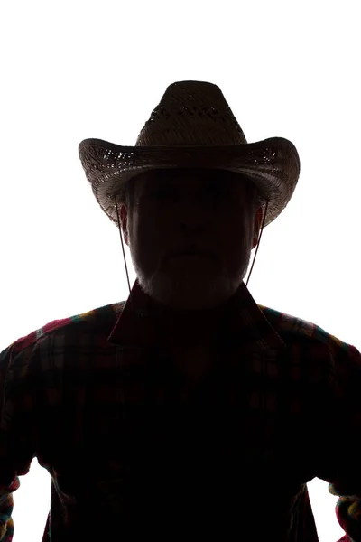 Homem velho em chapéu de cowboy, visão dianteira - silhueta de close-up escura — Fotografia de Stock
