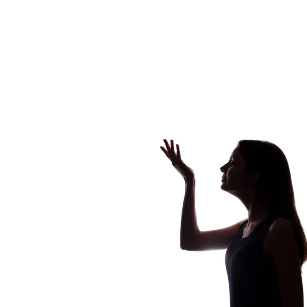 Mujer joven muestra su dedo índice, la mano hacia adelante — Foto de Stock