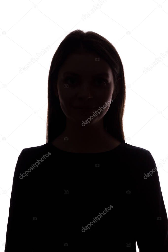 Young woman look ahead with flowing hair - silhouette