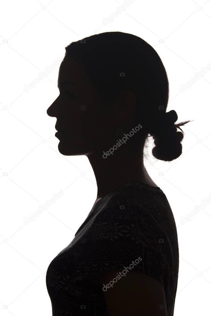 Silhouette young girl side view with hairstyle - isolated