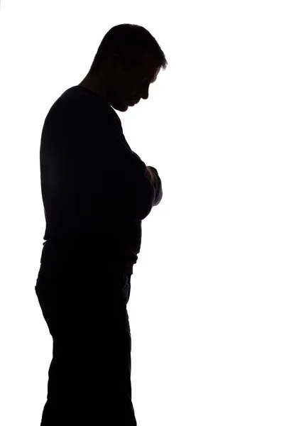 Porträt eines jungen Mannes, Seitenansicht - dunkle, isolierte Silhouette — Stockfoto