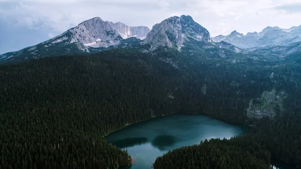 Aerial view at a beautiful lake in the mountains. Black Lake, Montenegro. — Stock Photo, Image