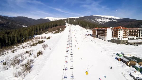 Aerial View of the Ski Resort in Mountains at Winter