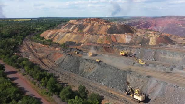 Open Quarry with heavy duty machinery. Construction industry aerial view. — Stock Video