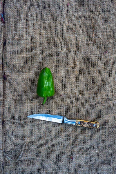 Bell Pepper Knife Sacktloth Background — Stock Photo, Image