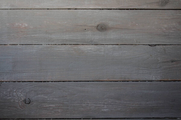 a light grey wooden background