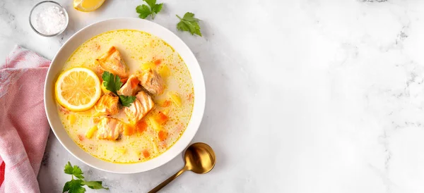 Top view of salmon fish soup on white background — Stock Image Top view of salmon fish soup on white background Royalty Free Stock Images