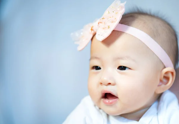 Asian baby happy in the room.Asian baby girl lying down on bed . — Stock Photo, Image